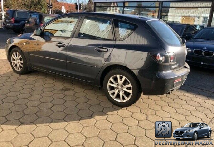 Plansa bord mazda 3 2004