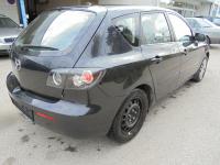Stalp central mazda 3 2004